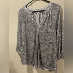 Crown & Ivy Silver Sequin Blouse size S
Perfect for holiday parties